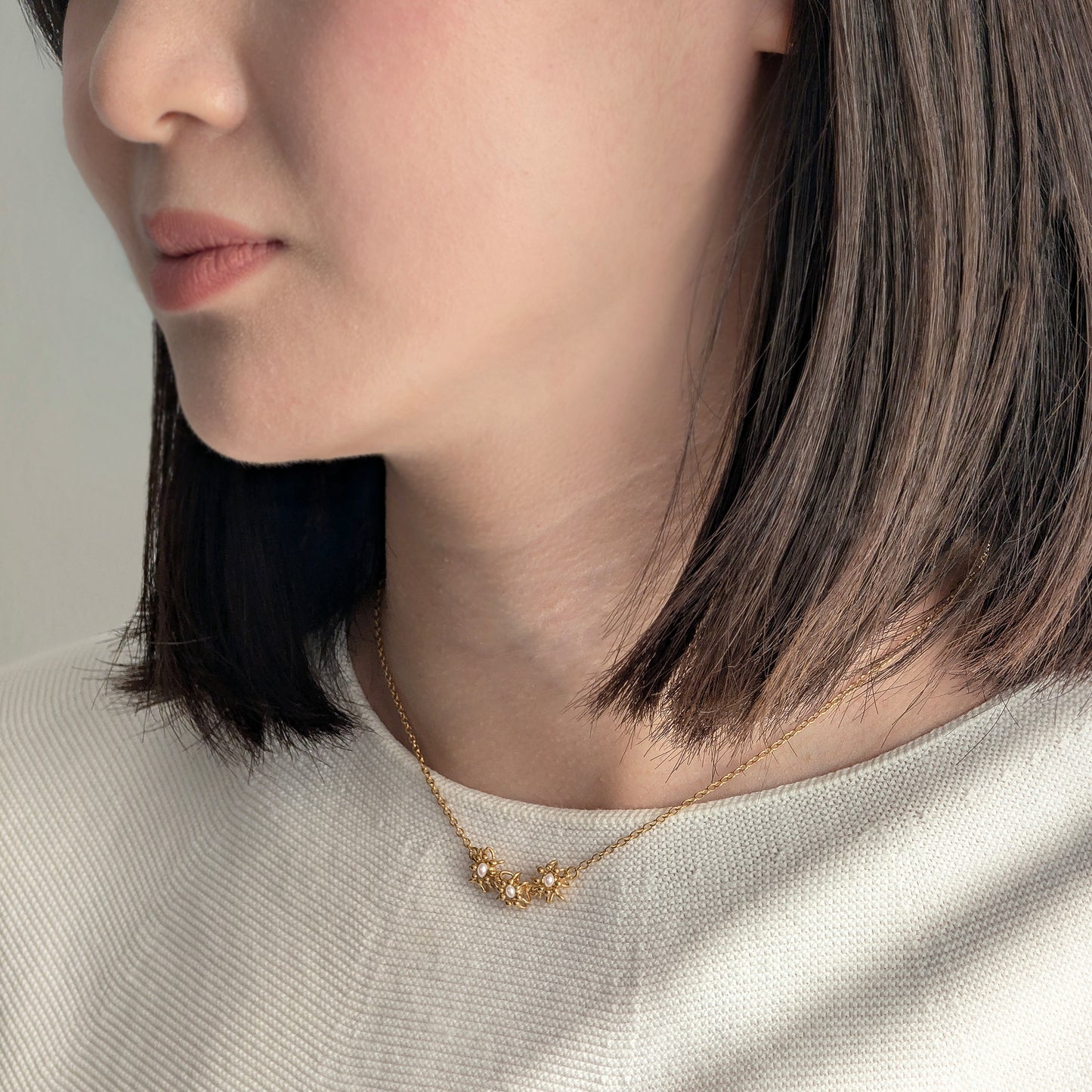 Gold Pearl Cascade Cell Necklace